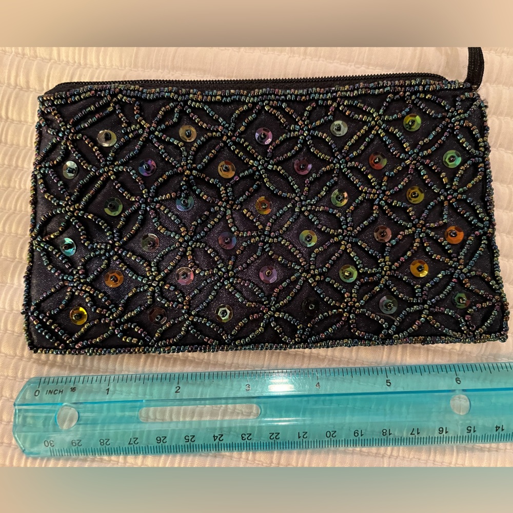 LAST CHANCE - Sequined small zip purse. About 7” by 4”. Black satin.